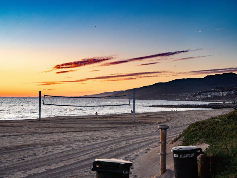 Volleyball court with sunset in the background at Will Rogers State Beach